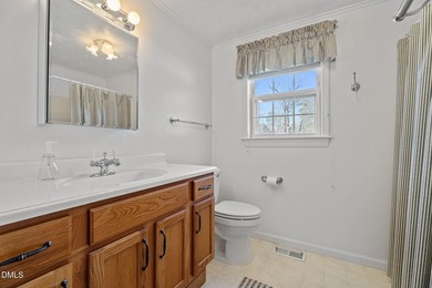 Welcome to lake living in this charming Ranch home located in a on River Golf and Country Club at Lake Royale in North Carolina - for sale on GolfHomes.com, golf home, golf lot