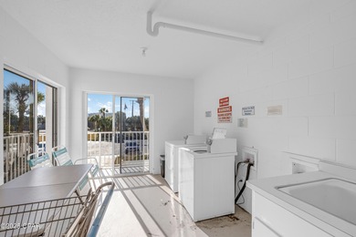 UPDATED. GOLF NEXT DOOR. MINUTES TO THE BEACH. This 2-bed on Holiday Golf Club in Florida - for sale on GolfHomes.com, golf home, golf lot