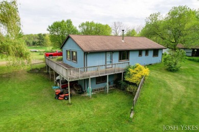 Beautiful acreage set up for horses! This lovely 3 bed, 1.5 bath on Grand Rapids Sparta Moose Golf Course in Michigan - for sale on GolfHomes.com, golf home, golf lot