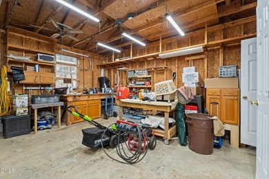 Welcome to lake living in this charming Ranch home located in a on River Golf and Country Club at Lake Royale in North Carolina - for sale on GolfHomes.com, golf home, golf lot