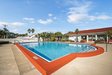 UPDATED. GOLF NEXT DOOR. MINUTES TO THE BEACH. This 2-bed on Holiday Golf Club in Florida - for sale on GolfHomes.com, golf home, golf lot