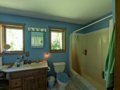 Beautiful acreage set up for horses! This lovely 3 bed, 1.5 bath on Grand Rapids Sparta Moose Golf Course in Michigan - for sale on GolfHomes.com, golf home, golf lot