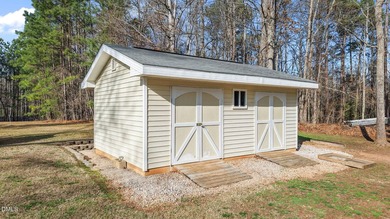 Welcome to lake living in this charming Ranch home located in a on River Golf and Country Club at Lake Royale in North Carolina - for sale on GolfHomes.com, golf home, golf lot