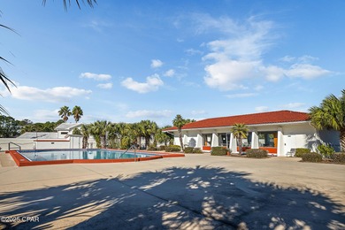 UPDATED. GOLF NEXT DOOR. MINUTES TO THE BEACH. This 2-bed on Holiday Golf Club in Florida - for sale on GolfHomes.com, golf home, golf lot