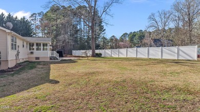 Welcome to lake living in this charming Ranch home located in a on River Golf and Country Club at Lake Royale in North Carolina - for sale on GolfHomes.com, golf home, golf lot