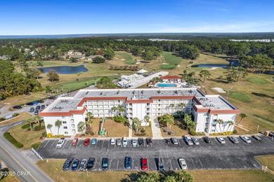 UPDATED. GOLF NEXT DOOR. MINUTES TO THE BEACH. This 2-bed on Holiday Golf Club in Florida - for sale on GolfHomes.com, golf home, golf lot