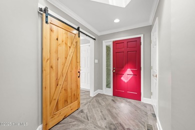 Welcome to 104 Lantern Lane: Discover this stunning home nestled on River Bend Golf and Country Club in North Carolina - for sale on GolfHomes.com, golf home, golf lot