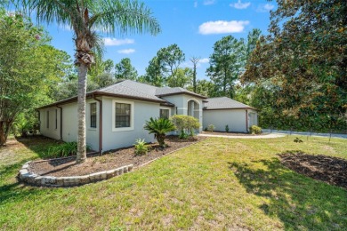 Built by Lindhorst, this warm and welcoming pool home is on Sugarmill Woods Golf and Country Club in Florida - for sale on GolfHomes.com, golf home, golf lot