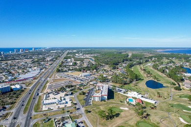 UPDATED. GOLF NEXT DOOR. MINUTES TO THE BEACH. This 2-bed on Holiday Golf Club in Florida - for sale on GolfHomes.com, golf home, golf lot