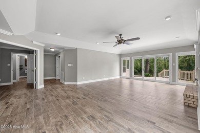 Welcome to 104 Lantern Lane: Discover this stunning home nestled on River Bend Golf and Country Club in North Carolina - for sale on GolfHomes.com, golf home, golf lot