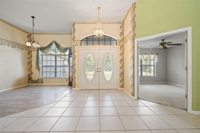 Built by Lindhorst, this warm and welcoming pool home is on Sugarmill Woods Golf and Country Club in Florida - for sale on GolfHomes.com, golf home, golf lot