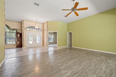 Built by Lindhorst, this warm and welcoming pool home is on Sugarmill Woods Golf and Country Club in Florida - for sale on GolfHomes.com, golf home, golf lot