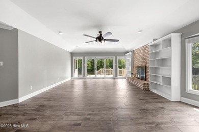 Welcome to 104 Lantern Lane: Discover this stunning home nestled on River Bend Golf and Country Club in North Carolina - for sale on GolfHomes.com, golf home, golf lot