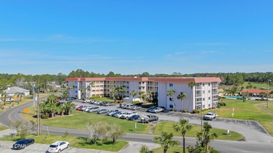 UPDATED. GOLF NEXT DOOR. MINUTES TO THE BEACH. This 2-bed on Holiday Golf Club in Florida - for sale on GolfHomes.com, golf home, golf lot