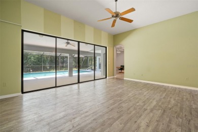 Built by Lindhorst, this warm and welcoming pool home is on Sugarmill Woods Golf and Country Club in Florida - for sale on GolfHomes.com, golf home, golf lot