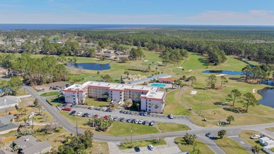 UPDATED. GOLF NEXT DOOR. MINUTES TO THE BEACH. This 2-bed on Holiday Golf Club in Florida - for sale on GolfHomes.com, golf home, golf lot