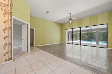 Built by Lindhorst, this warm and welcoming pool home is on Sugarmill Woods Golf and Country Club in Florida - for sale on GolfHomes.com, golf home, golf lot