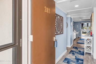 UPDATED. GOLF NEXT DOOR. MINUTES TO THE BEACH. This 2-bed on Holiday Golf Club in Florida - for sale on GolfHomes.com, golf home, golf lot