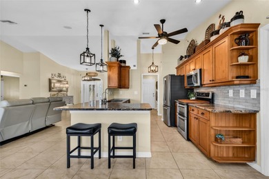 Welcome Home!  Impeccably Maintained 4-bedroom Salt Water Pool on Seminole Lakes Country Club in Florida - for sale on GolfHomes.com, golf home, golf lot