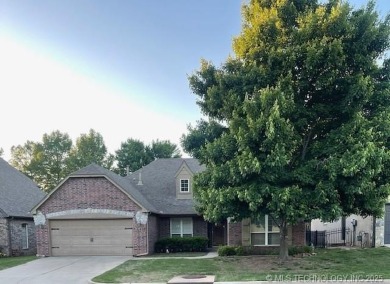 Lovely custom brick home nestled in the charming gated golf on Battle Creek Golf Course in Oklahoma - for sale on GolfHomes.com, golf home, golf lot
