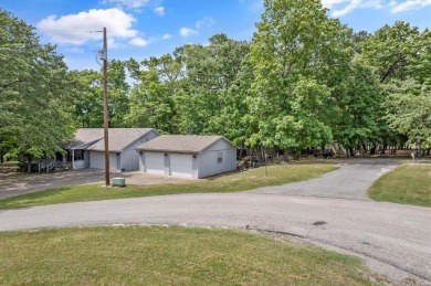 Immaculate home on 3 wooded lots in highly sought-after gated on Holly Lake Ranch Golf Club in Texas - for sale on GolfHomes.com, golf home, golf lot