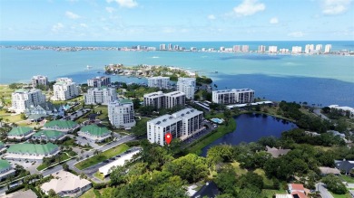 This peaceful, light-filled end unit has its own private 1,400 on Belleair Country Club in Florida - for sale on GolfHomes.com, golf home, golf lot