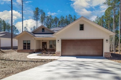 Welcome Home to this 2024 Build located just one street over on Granada Golf Course in Arkansas - for sale on GolfHomes.com, golf home, golf lot