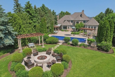 Gorgeous all brick masterpiece located on PRIVATE deep lot on The Legend At Bristlecone in Wisconsin - for sale on GolfHomes.com, golf home, golf lot