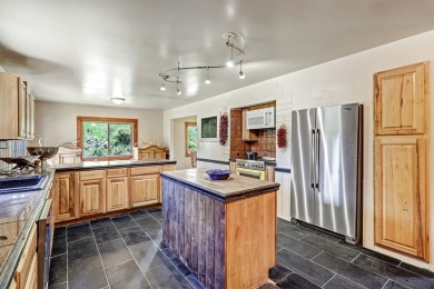 Conveniently located halfway between Taos and Angel Fire, along on El Valle Escondido Golf Course in New Mexico - for sale on GolfHomes.com, golf home, golf lot