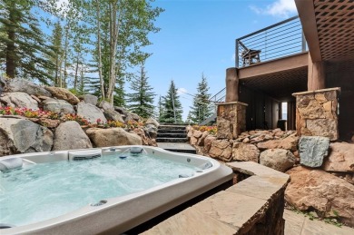 This stunning Highlands at Breckenridge retreat sits on over an on Breckenridge Golf Club in Colorado - for sale on GolfHomes.com, golf home, golf lot