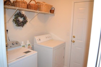 This home is value priced with room for built-in upside on Mirror Lake Golf Club in Georgia - for sale on GolfHomes.com, golf home, golf lot
