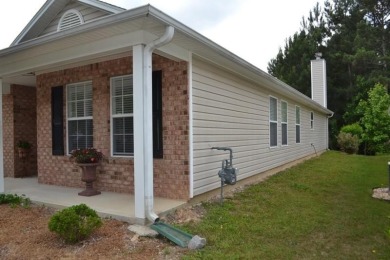 This home is value priced with room for built-in upside on Mirror Lake Golf Club in Georgia - for sale on GolfHomes.com, golf home, golf lot