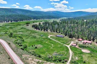 Conveniently located halfway between Taos and Angel Fire, along on El Valle Escondido Golf Course in New Mexico - for sale on GolfHomes.com, golf home, golf lot