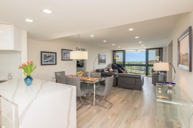 Beautifully updated open 3 bedroom 2 bath corner unit with floor on The President Country Club in Florida - for sale on GolfHomes.com, golf home, golf lot