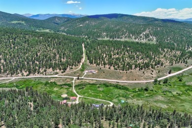 Conveniently located halfway between Taos and Angel Fire, along on El Valle Escondido Golf Course in New Mexico - for sale on GolfHomes.com, golf home, golf lot