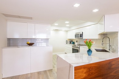 Beautifully updated open 3 bedroom 2 bath corner unit with floor on The President Country Club in Florida - for sale on GolfHomes.com, golf home, golf lot