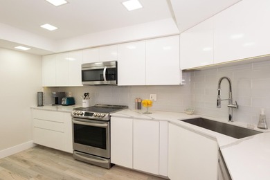 Beautifully updated open 3 bedroom 2 bath corner unit with floor on The President Country Club in Florida - for sale on GolfHomes.com, golf home, golf lot