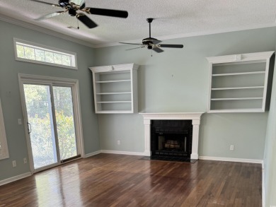 This two-bedroom three bath home is tucked away on a quiet on Wedgefield Plantation Golf Club in South Carolina - for sale on GolfHomes.com, golf home, golf lot