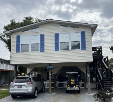 Beautiful, updated Pier Home located in Oceanside Village on Tupelo Bay Golf Complex  in South Carolina - for sale on GolfHomes.com, golf home, golf lot