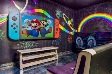 MUST SEE THIS FULLY DISNEY-THEMED POOL HOME WITH LAKE VIEW IN on The Oasis Club at Champions Gate in Florida - for sale on GolfHomes.com, golf home, golf lot