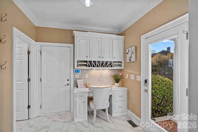 Set on a peaceful .85-acre cul-de-sac lot in the heart of The on Trump National Golf Club Charlotte in North Carolina - for sale on GolfHomes.com, golf home, golf lot