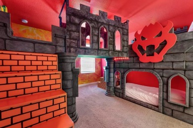 MUST SEE THIS FULLY DISNEY-THEMED POOL HOME WITH LAKE VIEW IN on The Oasis Club at Champions Gate in Florida - for sale on GolfHomes.com, golf home, golf lot