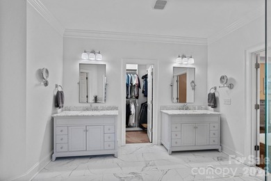 Set on a peaceful .85-acre cul-de-sac lot in the heart of The on Trump National Golf Club Charlotte in North Carolina - for sale on GolfHomes.com, golf home, golf lot