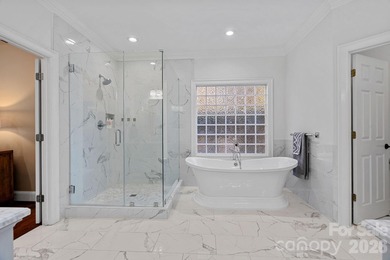 Set on a peaceful .85-acre cul-de-sac lot in the heart of The on Trump National Golf Club Charlotte in North Carolina - for sale on GolfHomes.com, golf home, golf lot