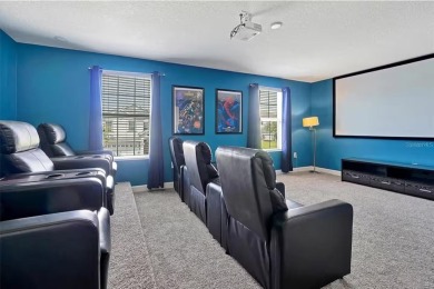 MUST SEE THIS FULLY DISNEY-THEMED POOL HOME WITH LAKE VIEW IN on The Oasis Club at Champions Gate in Florida - for sale on GolfHomes.com, golf home, golf lot