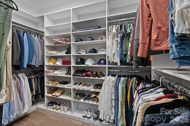 Set on a peaceful .85-acre cul-de-sac lot in the heart of The on Trump National Golf Club Charlotte in North Carolina - for sale on GolfHomes.com, golf home, golf lot