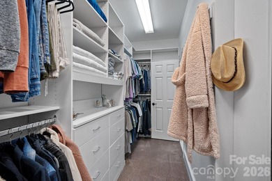 Set on a peaceful .85-acre cul-de-sac lot in the heart of The on Trump National Golf Club Charlotte in North Carolina - for sale on GolfHomes.com, golf home, golf lot