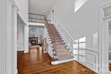 Set on a peaceful .85-acre cul-de-sac lot in the heart of The on Trump National Golf Club Charlotte in North Carolina - for sale on GolfHomes.com, golf home, golf lot