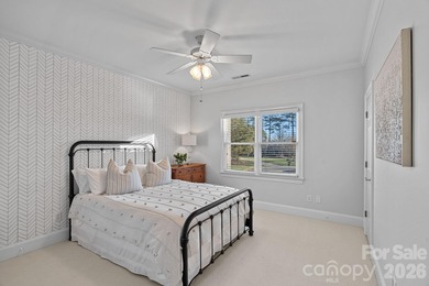 Set on a peaceful .85-acre cul-de-sac lot in the heart of The on Trump National Golf Club Charlotte in North Carolina - for sale on GolfHomes.com, golf home, golf lot