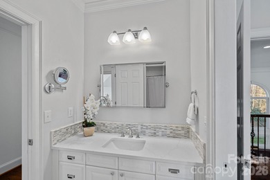 Set on a peaceful .85-acre cul-de-sac lot in the heart of The on Trump National Golf Club Charlotte in North Carolina - for sale on GolfHomes.com, golf home, golf lot